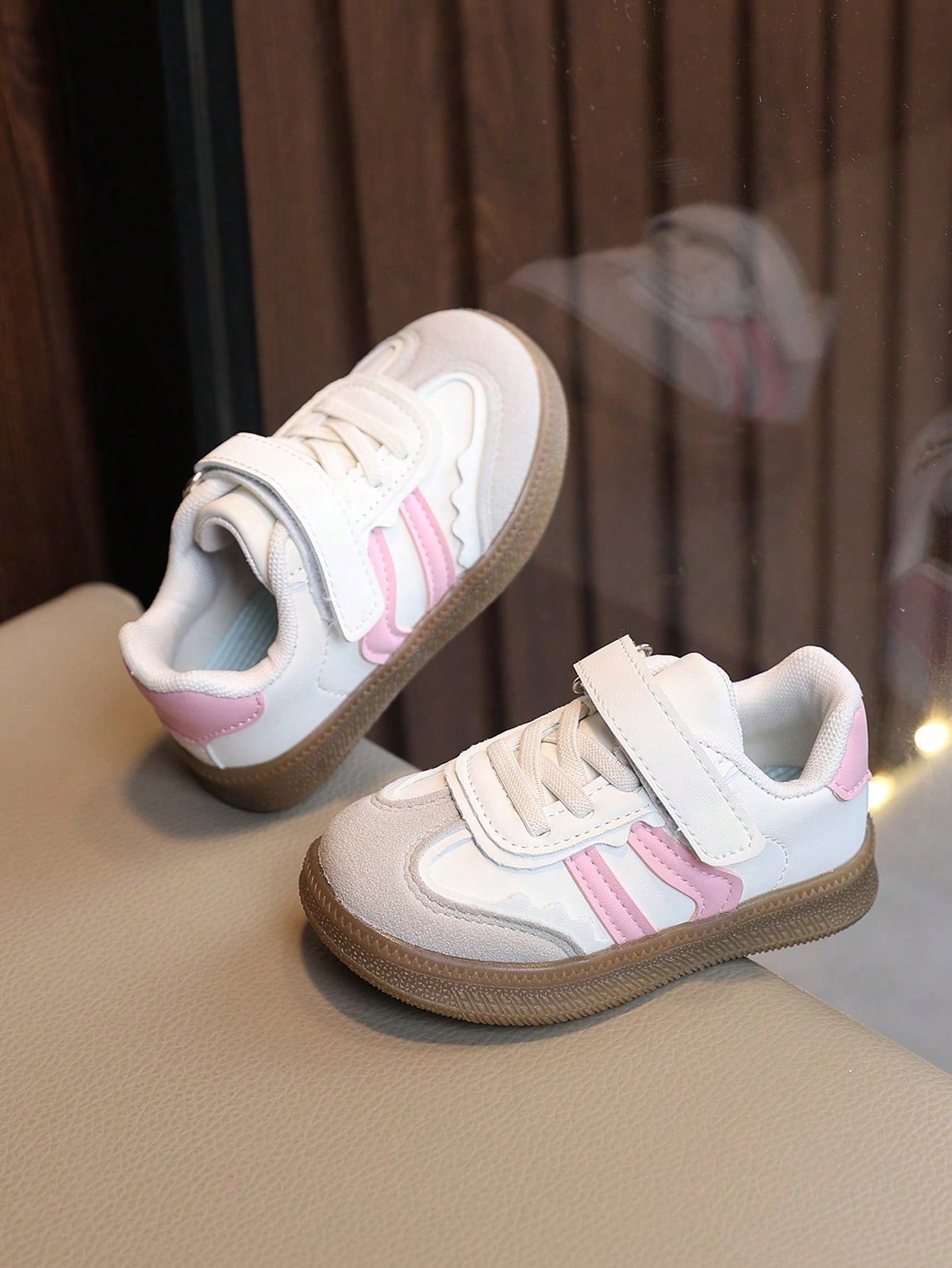 White in pink sneakers